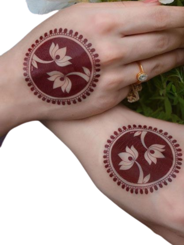 Intricate lotus mehndi design featuring floral patterns and traditional detailing on the front of palm.